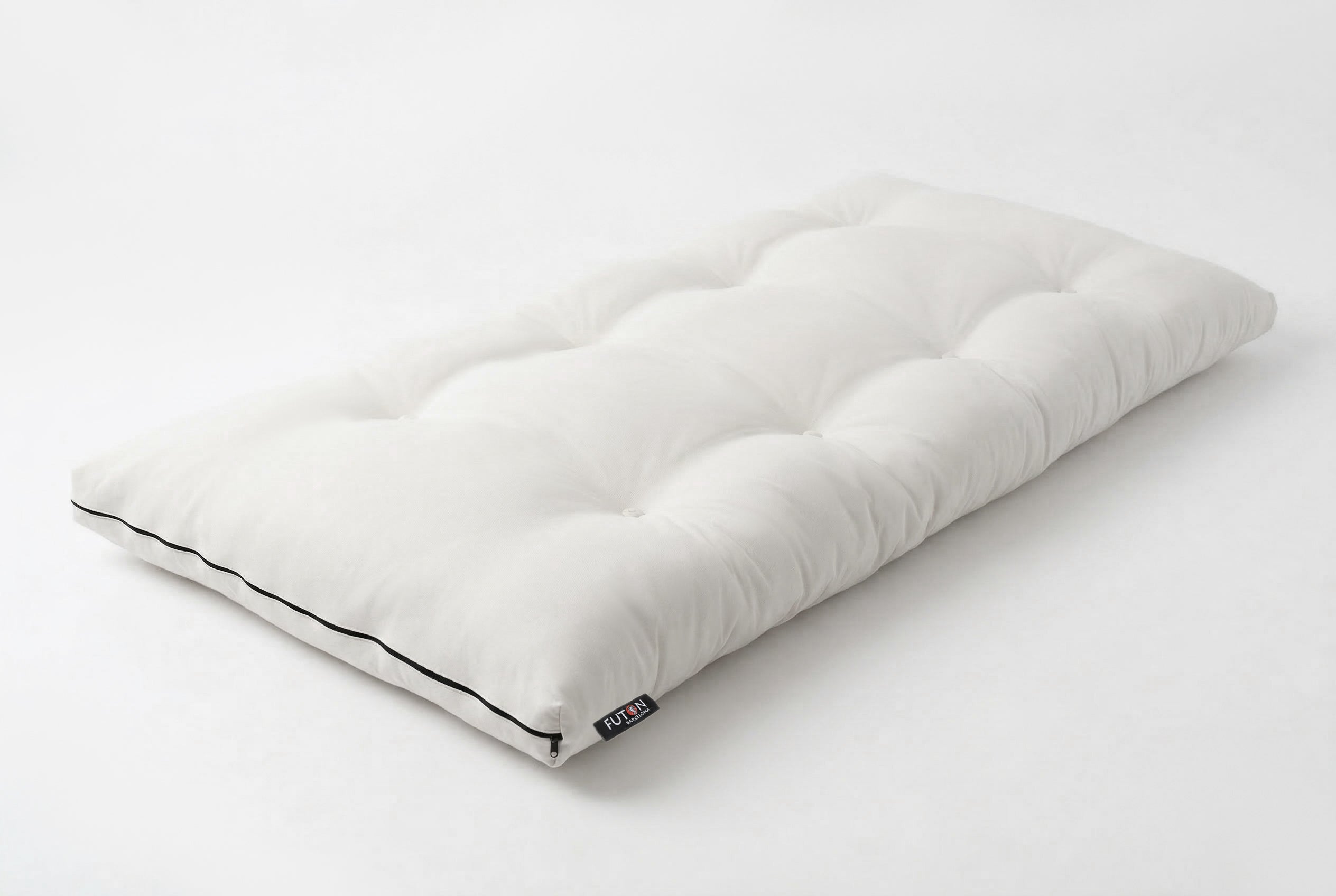 Futón japonés, colchón tradicional elaborado artesanalmente en Barcelona, ecológico y natural, con lazos para atar